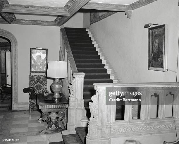 Here's the elaborate stairway leading to the upper rooms in the Fifth Avenue home of Serge Rubinstein, who was found dead today in his third floor...