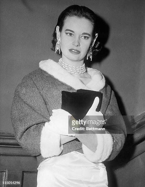 Gloria Vanderbilt, who left her husband, the famed 67-year-old conductor Leopold Stokowski, is shown at the Alvin Theater tonight where she attended...