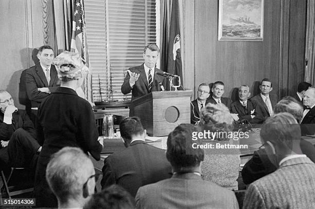 Attorney General Robert Kennedy announces to newsmen here that he has asked Congress to pass eight new laws which would enable the FBI to step up its...