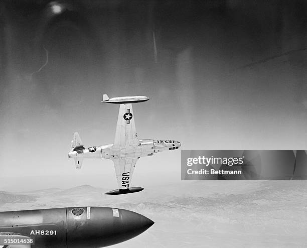 This is the first aerial photograph of Lockheed's new Rt-33 Photo Reconnaissance Airplane, the specialized jet that's built to take a good look....