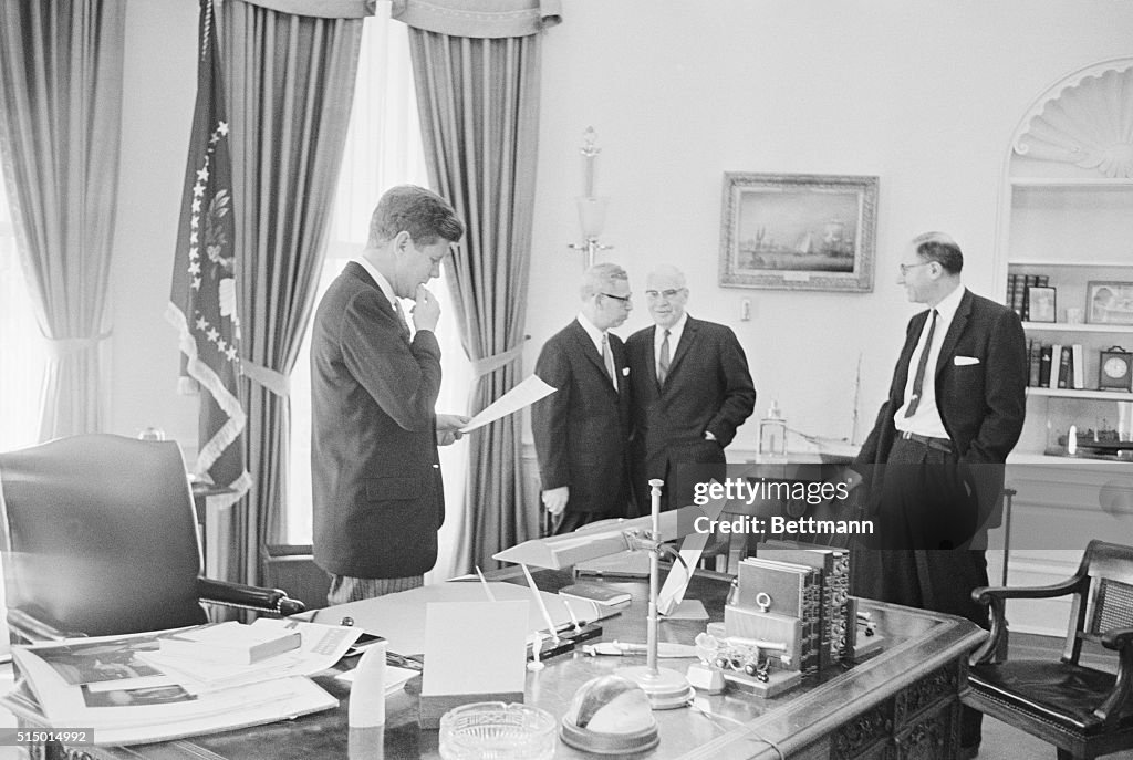 President Kennedy with Others in Oval Office
