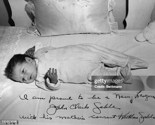 This photo shows John Clark Gable, the 21 day old son of the late actor. He is now a member of the Navy League, an organization in which his father...