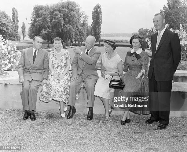 Geneva, Switzerland...Eisenhowers Hosts To Swiss President And Lady. An informal photo of the Eisenhowers and their guests on the lawn of the...