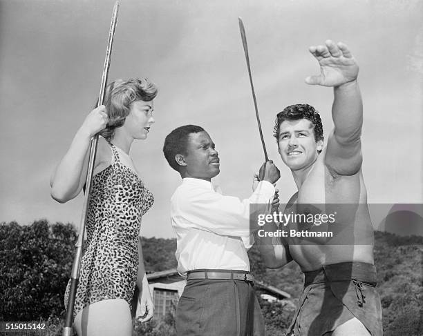 African Tarzan Meets Hollywood Version. Hollywood, California: Tarzan Ametowo , of Liberia, is instructing "Tarzan" Gordon Scott in the correct...