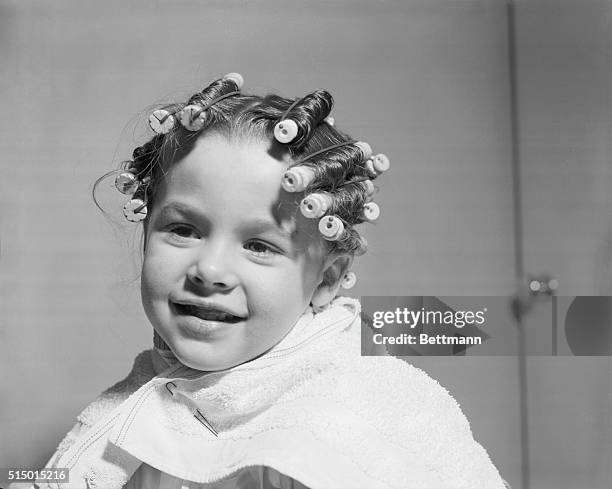 Glamorizing Teresa's Tresses. New York: In answer to pleas from mothers that "something be done about the stringy-looking hair of our four, six and...