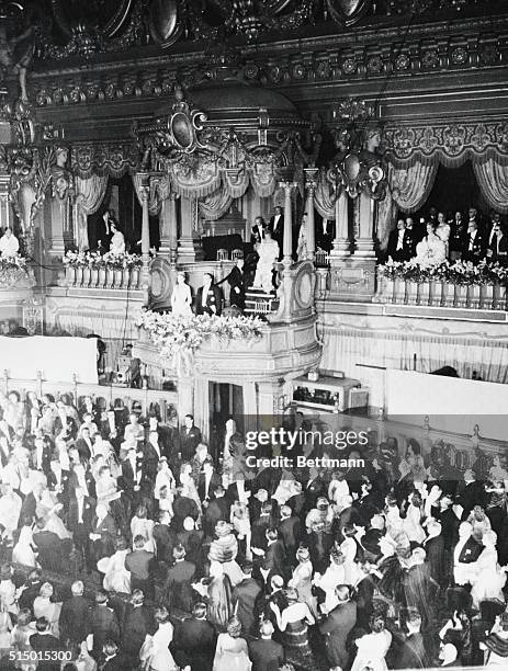 Their Serene Highnesses Hailed at Opera. Monte Carlo, Monaco: Prince Rainier and his new Princess, nee Grace Kelly, of Philadelphia, Pennsylvania,...