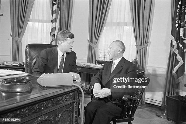 President Kennedy meets with West German Chancellor Konrad Adenauer in the Oval Office.