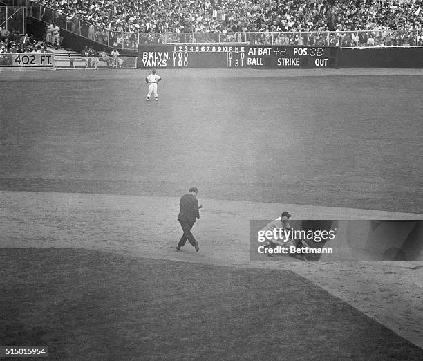 The Duke slides in with two-bagger. Yankee Stadium, NY: Duke Snider of the Dodgers slides safely into second with a two-bagger in the fourth frame of...