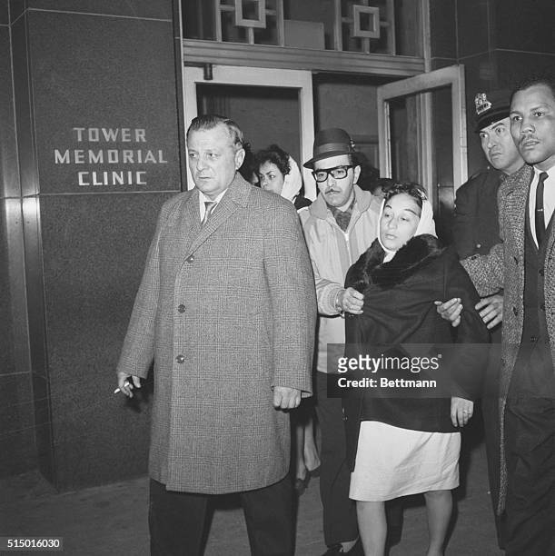 Boxing manager Manuel Alfaro and Lucy Paret leave Roosevelt Hospital, in New York, after welterweight boxing champion Benny "Kid" Paret died as a...