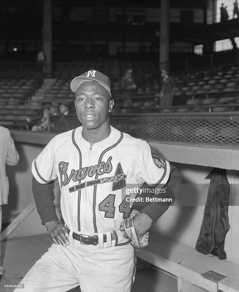 Baseball Player Hank Aaron Standing in Dugout