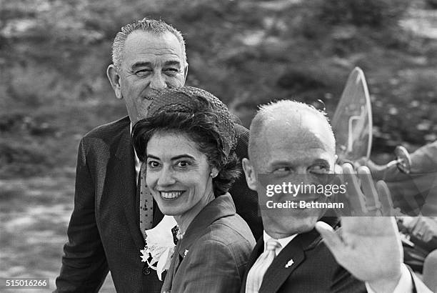 Astronaut Returns. Cocoa Beach, Florida: Astronaut John Glenn waves to crowd during parade following his return after his February 20th orbital space...