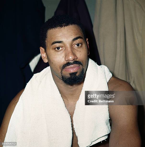 Wilt Chamberlain, in his home with some of his trophies, 1962. UPI color-slide.