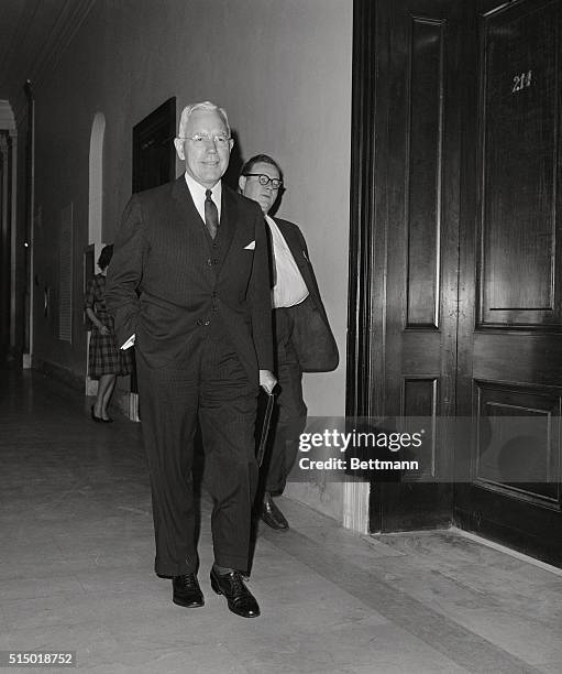 Central Intelligence Agency Director John M. McCone is shown as he arrived at the Senate Armed Services Committee, where he said that Powers lived up...