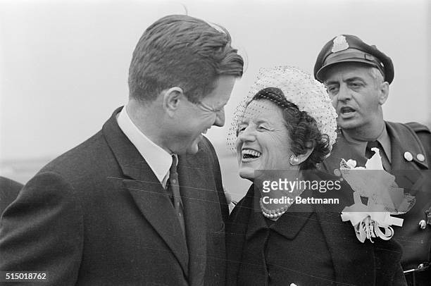 Mrs. Joseph P. Kennedy, enjoys a laugh with her youngest son, Edward Kennedy, at Logan International Airport before flying to Palm Beach to join her...
