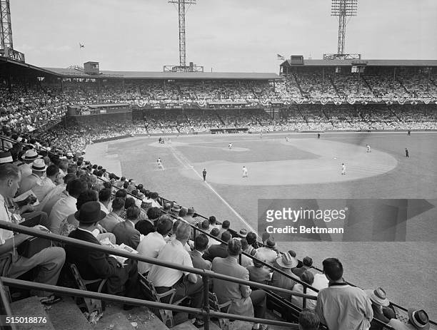 Batter Up at Start of All Star Game. Washington, D.C.: A general view of the diamond and packed stands at Griffith Stadium today as the 23rd annual...