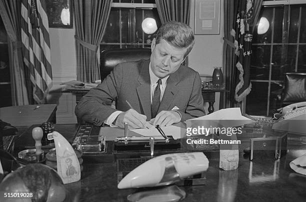 President Kennedy tonight signs a proclamation formally putting into effect at 10 A.M. EDT tomorrow the U.S. Arms Quarantine against Cuba. The...
