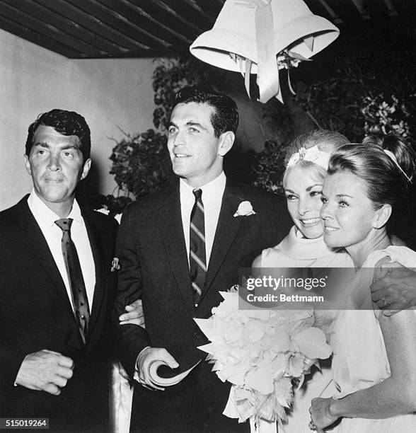 Las Vegas, Nevada: Janet Leigh and Hollywood stockbroker, Robert Brandt, center, were married at the Sands Hotel in Las Vegas today, . Singer Dean...