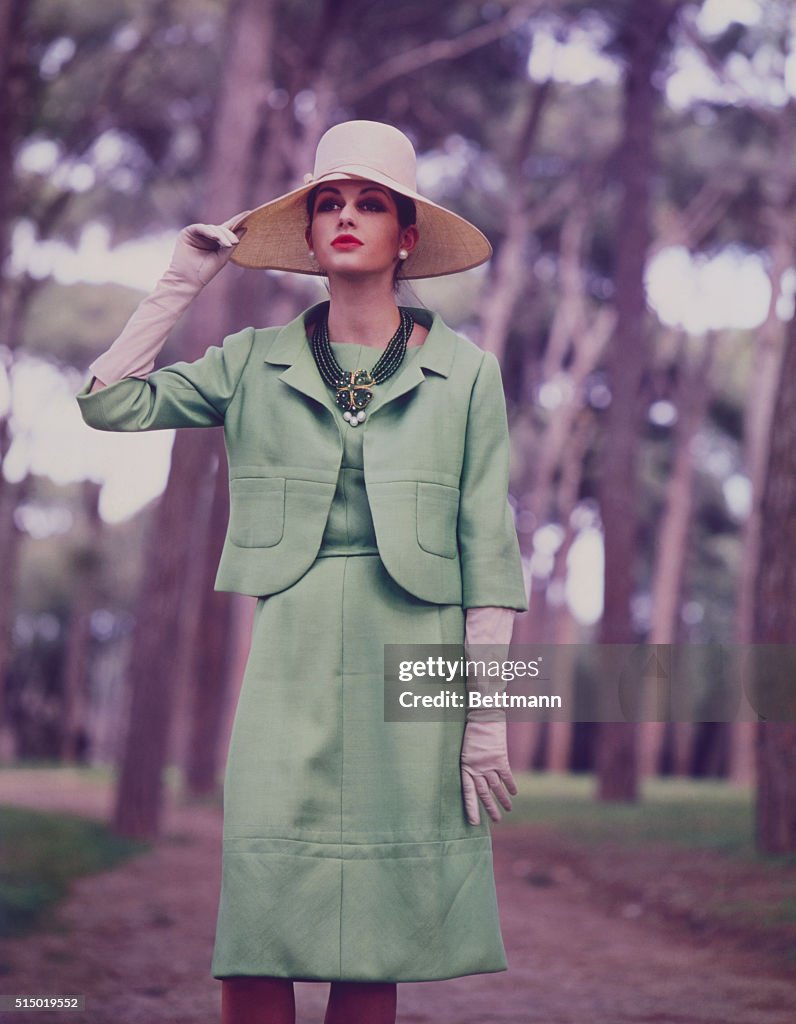 Model Posing in Green Linen Suit