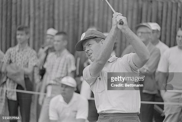 Oakmont, PA: A determined Gene Littler blasts off on the 2nd hole at the Oakmont Country Club June 14th. Littler had a 69 to lead the field at the...