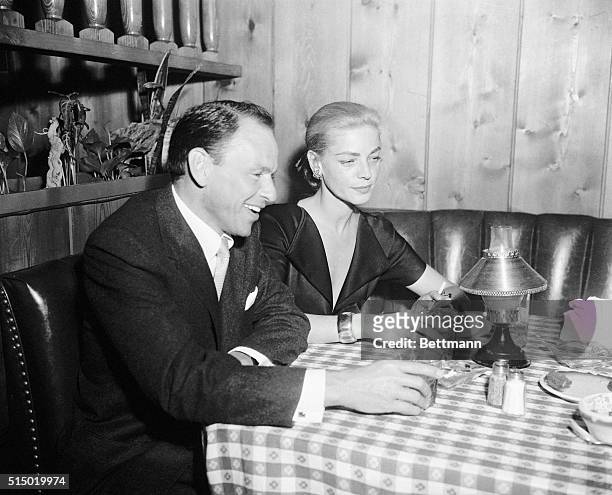 People Will Say Their'etc! Hollywood, California: Frank Sinatra and Lauren Bacall, widow of Humphrey Bogart, are shown at the party thrown by Sinatra...