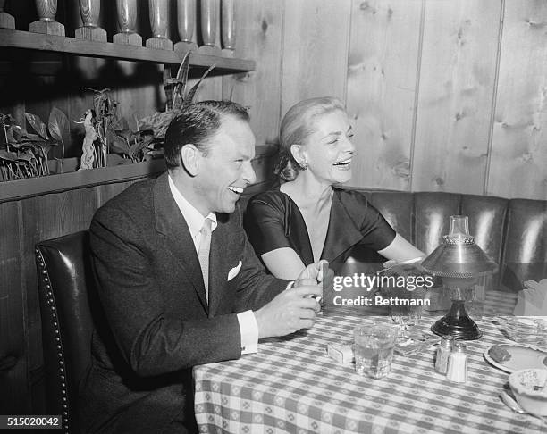 People Will Say Their'etc! Hollywood, California: Frank Sinatra and Lauren Bacall, widow of Humphrey Bogart, are shown at the party thrown by Sinatra...