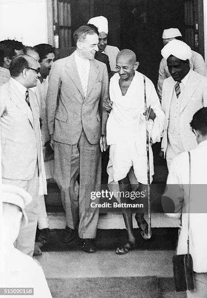 Stafford Cripps and Mahatma K. Gandhi are shown at the Indian National Conference which rejected the British proposals for Indian Dominion. Cripps is...