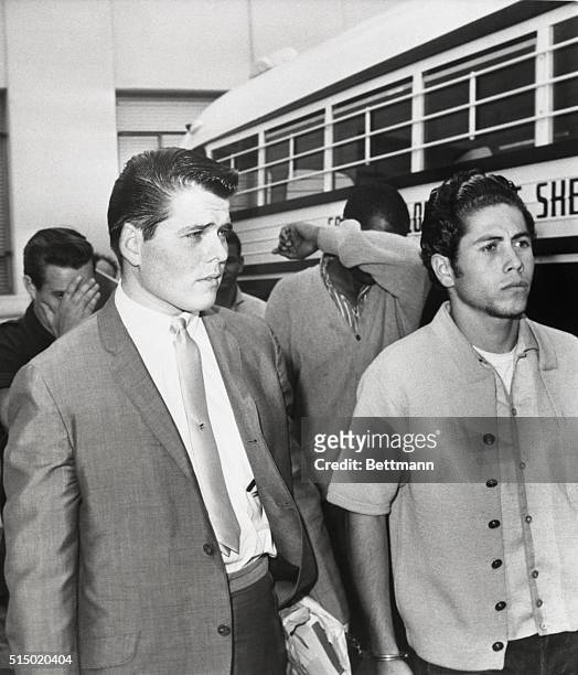 Railroad heir Timothy Nicholson is led to a prison bus after he was convicted of manslaughter for the fatal shooting of his twin brother, Todd. The...