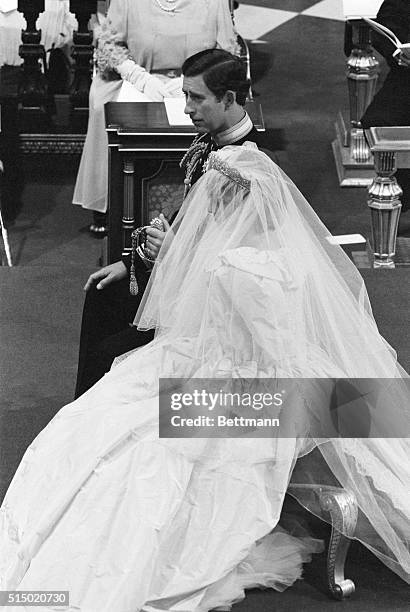 Photo shows Diana Spencer and Prince Charles during their wedding ceremony.