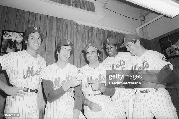 Mets' manager Joe Torre is flanked by newest members of the team, acquired in the "Midnight Massacre" trades that sent Tom Seaver to Cincinnati Reds...