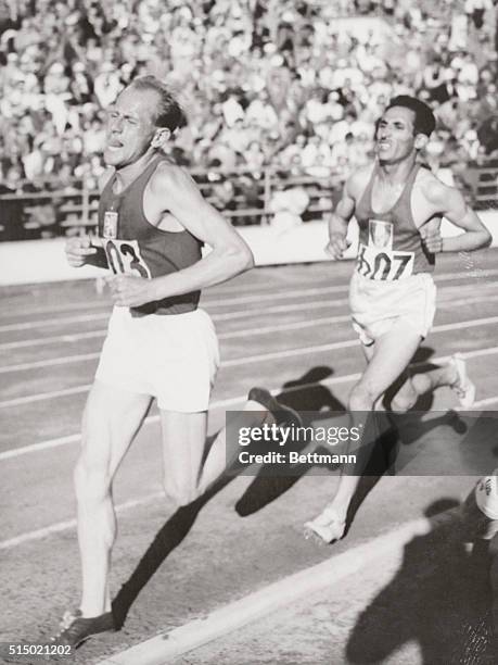 Czech Bouncing in to Win Olympic 10,000 Meter. Helsinki, Finland: Emil Zapotek of Czechoslovakia is shown winning the 10,000 Meter Event at the...