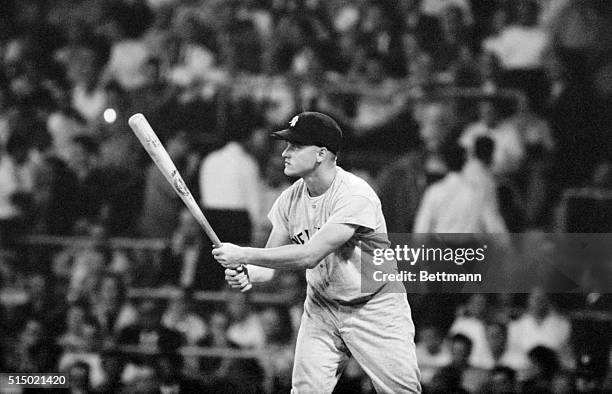 Roger Maris gives White Sox pitcher Don Larsen a look of determination as he waits an offering in 2nd inning of White Sox-Yankees game, 9/13. On next...