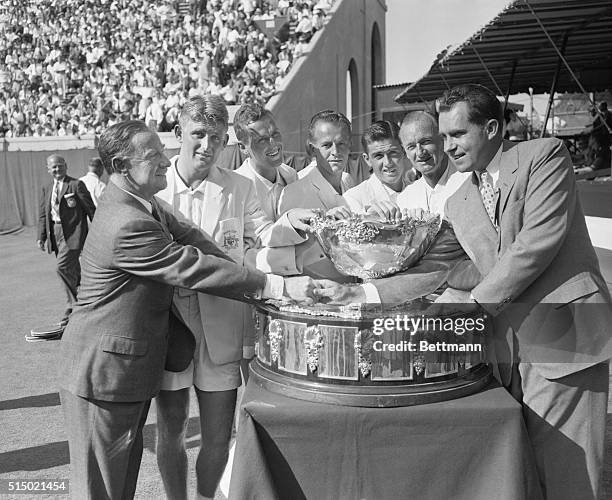 Nixon Presents Davis Cup to Aussies. Forest Hills, Long Island: Vice President Richard Nixon congratulates Sir Percy Spender, Australian ambassador,...