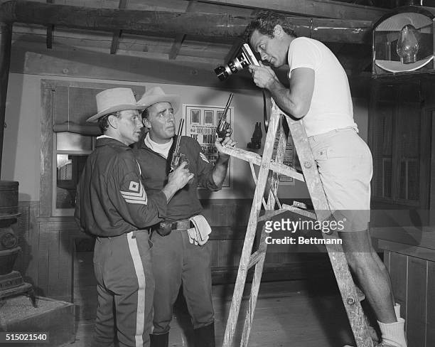 Shooting Stars. Hollywood: If the photographer on the ladder shooting Frank Sinatra and Peter Lawford seems familiar, it's because he's actor Tony...