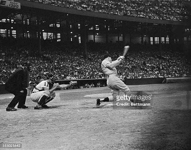 Mickey Mantle does some swinging in the second inning of the Yankees-Indians game here. His partner, home run hitter, Roger Maris, struck out in the...