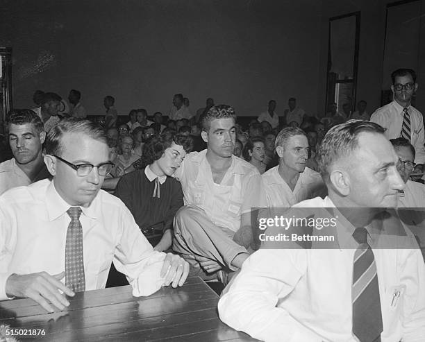 Mrs. Bryant Gives "Wolf Whistle" Account. Sumner, Mississippi: Carolyn Bryant and her husband, Roy, consult with defense attorney Sidney Carlton at...