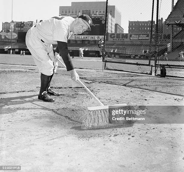 With the American League Pennant safely tucked away in mothballs, manager Casey Stengel of the New York Yankees has the time to indulge in his...