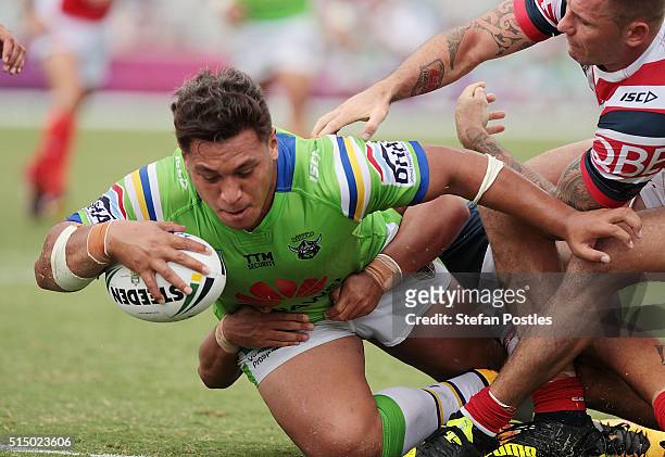 Josh Papalii of the Raiders scores a try during the round two NRL match between the Canberra Raiders and the Sydney Roosters at GIO Stadium on March...