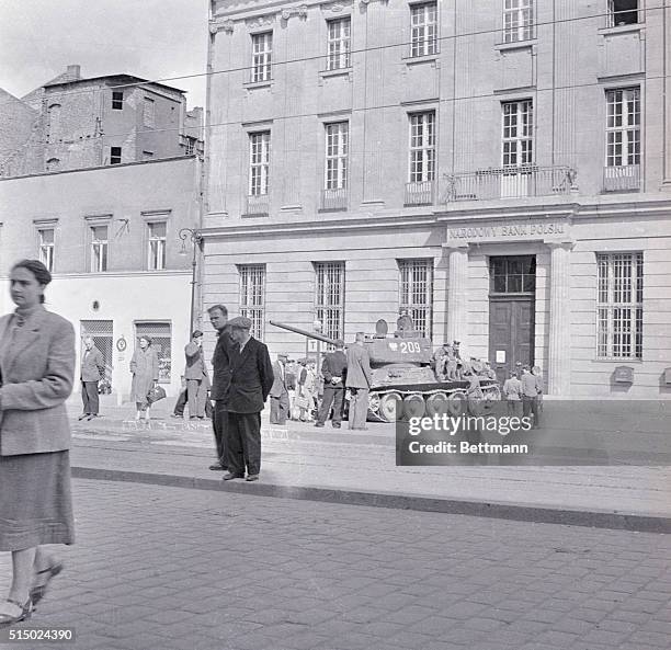 Tank guards bank in Polish "bread" revolt. Poznan, Poland: A tank of the Red Polish Government is on guard outside a bank in Poznan during the...