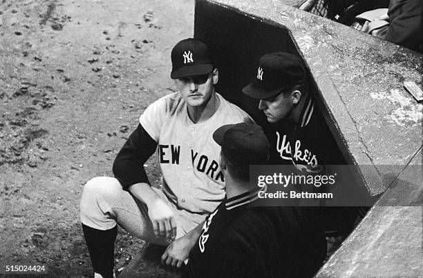 Roger Maris looks glum in the dugout after striking out in the sixth inning of first game of twi-night doubleheader with the Tigers 9/15. Maris...