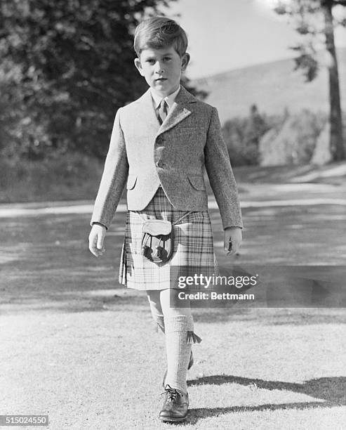 All This and Seven, Too. Balmoral, Scotland: Resplendent in a kilt of Balmoral tartan, restricted to members of the royal family, Prince Charles, son...