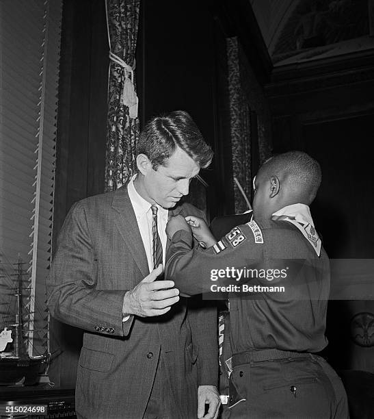 Attorney General Robert F. Kennedy was presented a scout emblem today as part of the celebration of the 52nd anniversary of the Boy Scouts of...