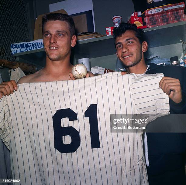Sal Durante of Brooklyn, NY, posed with Roger Maris as Durante displays the ball with which Maris blasted his 61st home run of the season, which Sal...