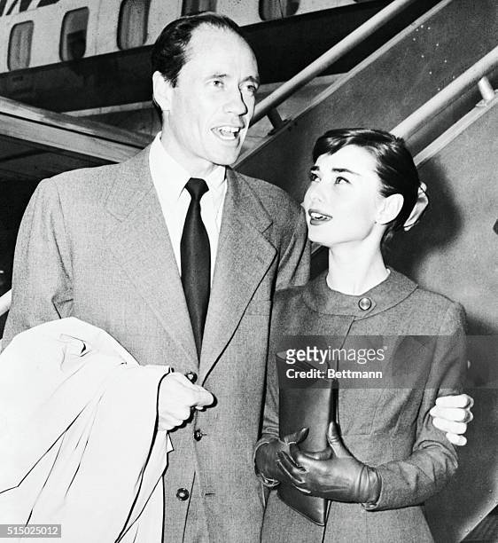 Film stars Audrey Hepburn and Mel Ferrer are pictured as they arrived in Hollywood from Rome for their first visit to the film capitol since their...