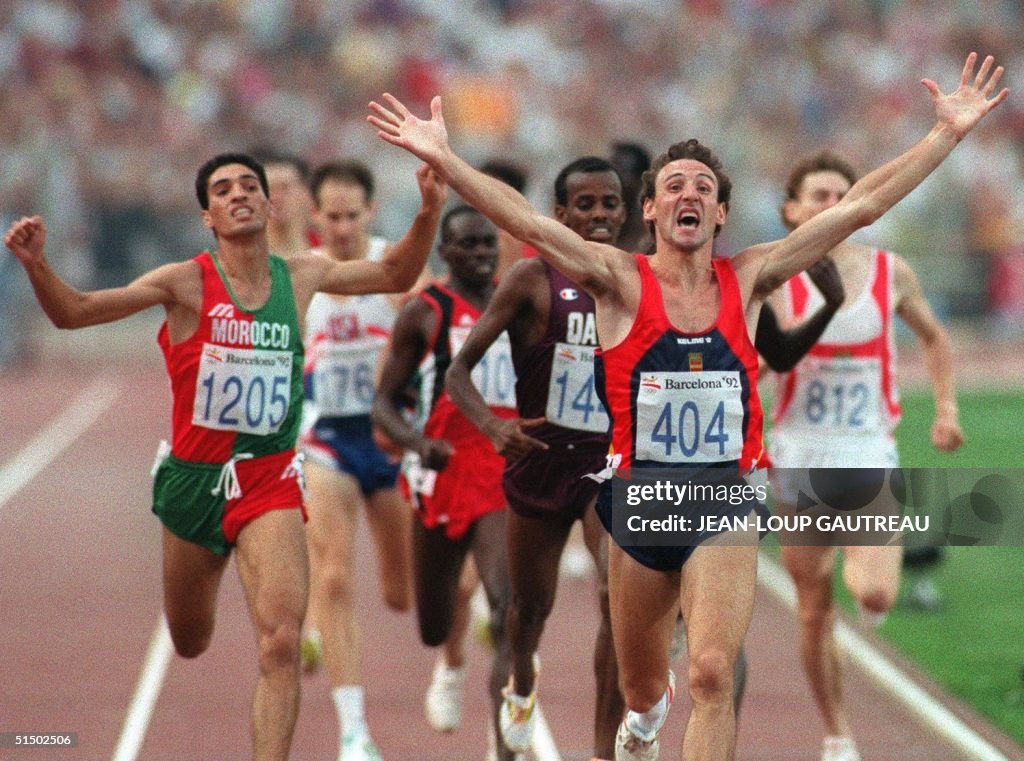 Fermin Cacho of Spain celebrates as he wins the go