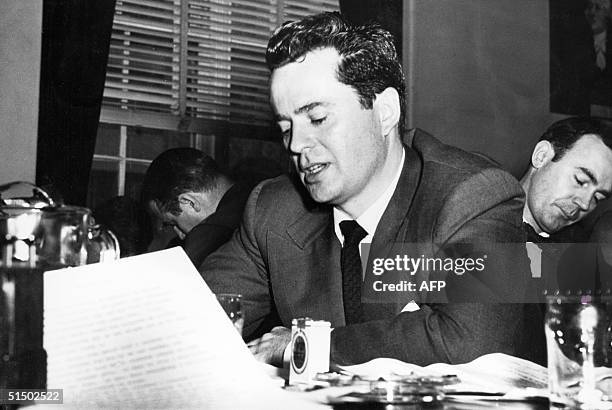 An undated picture shows American movie star Larry Parks testifying before the House Un-American Activities Committee in Washington in the early...