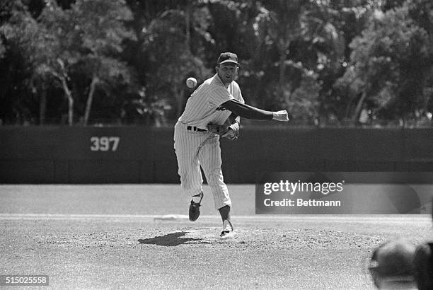 Roger Craig, who formerly toiled on the mound for the Los Angeles Dodgers, and who now works for the New York Mets, shows his pitching form here...