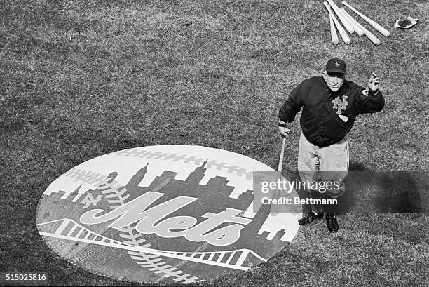 Casey Stengel, New York Mets manager, waves to St. Louis baseball fans as they gave him a welcoming ovation before the start of the season opener...