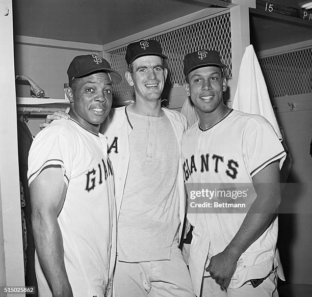 Gaylord Perry, , is congratulated by Willie Mays, and Orlando Cepeda after the rookie Perry pitched San Francisco into 1st place over the Pittsburgh...