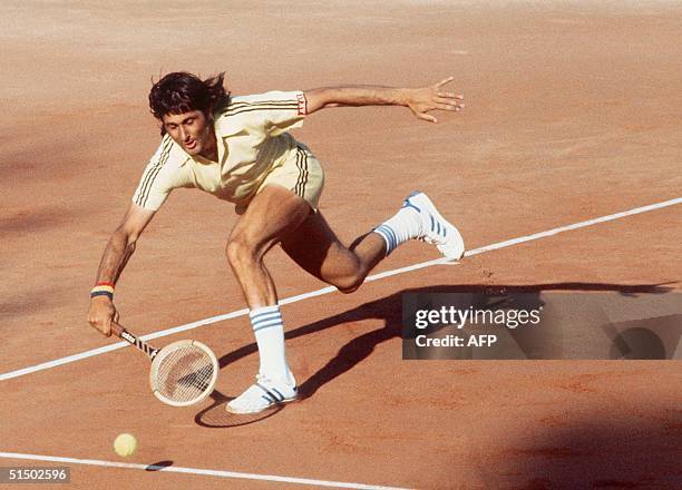 Romanian Ilie Nastase returns a ball during the Paris International tournament in June 1977. Nastase won the Forrest Hills championships in 1972 and...