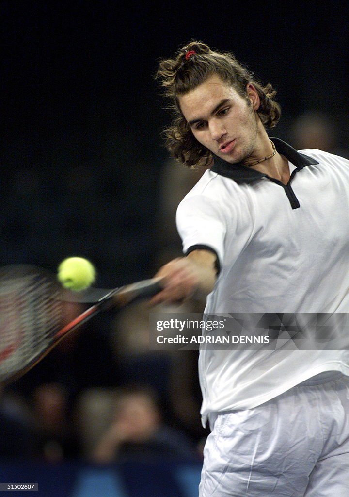 Switzerland's Roger Federer hits a forehand during